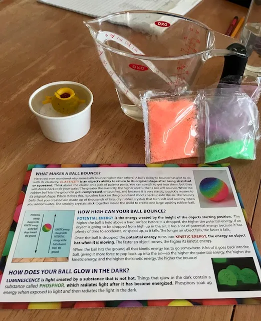 The bouncy ball project's supplies laid out beside its printed instruction card
